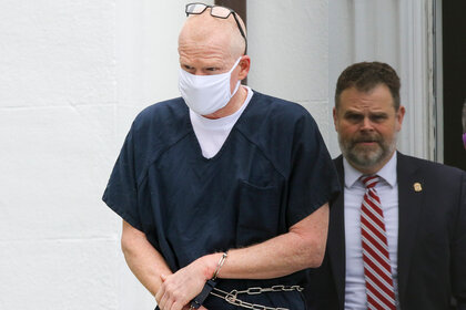 Alex Murdaugh is escorted out of the Colleton County Courthouse