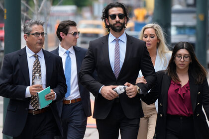 Defense attorneys for Pittsburgh dentist Lawrence "Larry" Rudolph head into federal courthouse