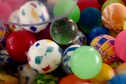 Colorful rubber balls inside a vending machine