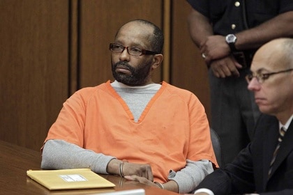 Anthony Sowell sits in a prison uniform in court.