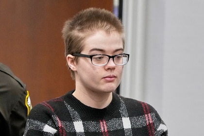 Morgan Geyser walks into the courtroom wearing glasses