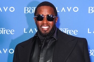 Sean "Diddy" Combs smiles on the red carpet at his birthday party