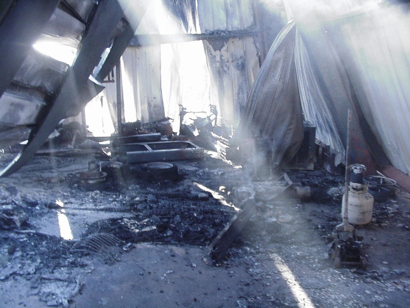 Ashes and rubble inside James Long's home.