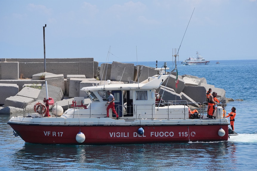 Fire rescue on a boat after searching for missing people after the luxury yacht Bayesian sank