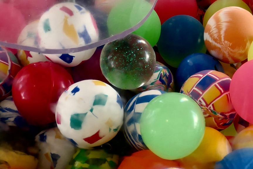 Colorful rubber balls inside a vending machine