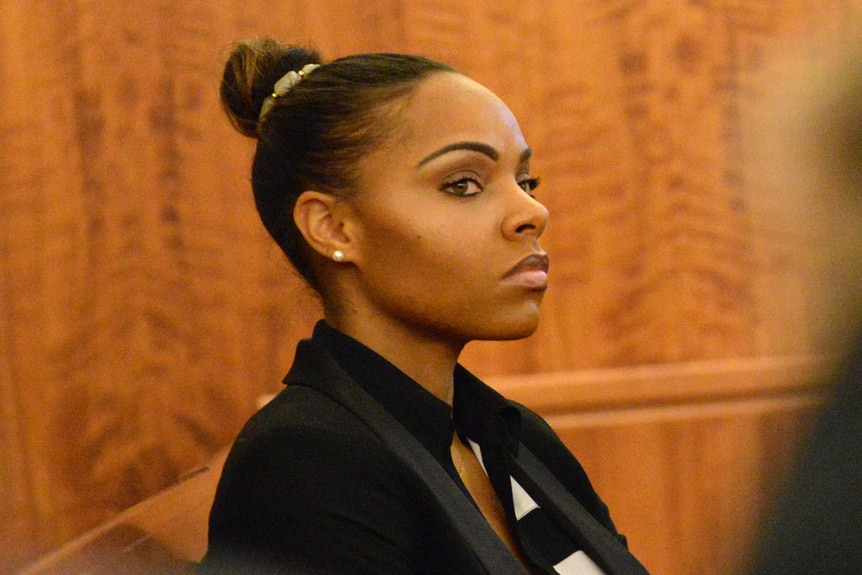 Shayanna Jenkins looks to her side in court during the Aaron Hernandez trial