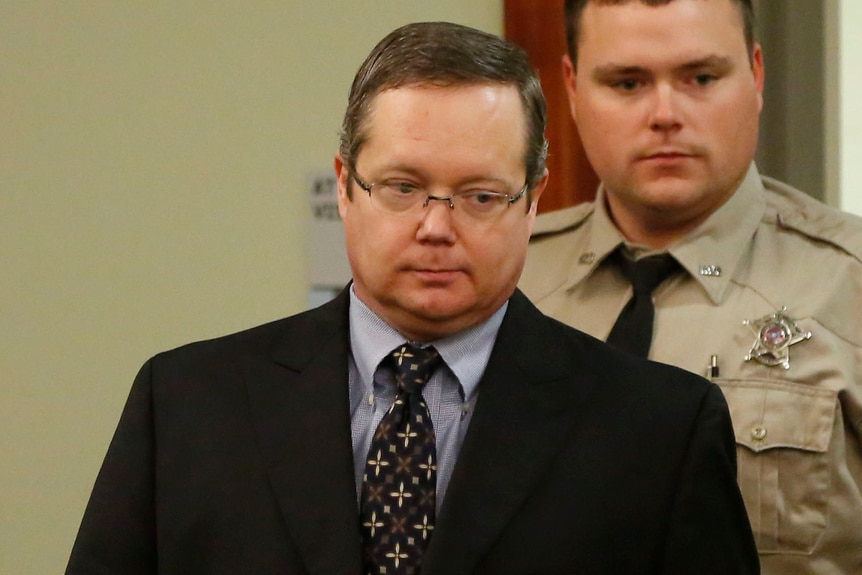 Eric Williams enters the courtroom for his trial