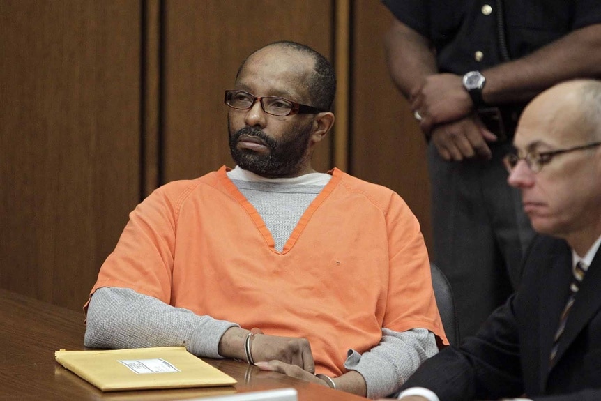 Anthony Sowell sits in a prison uniform in court.